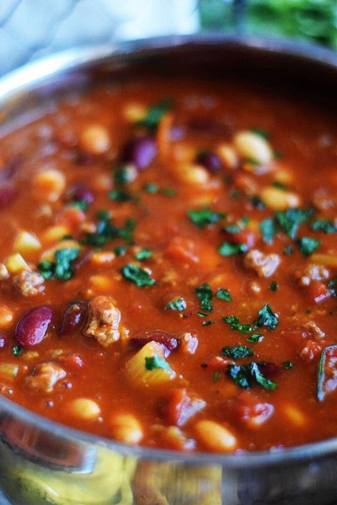 a closeup of this pasta fagioli soup recipe inside of a large pot on the stovetop