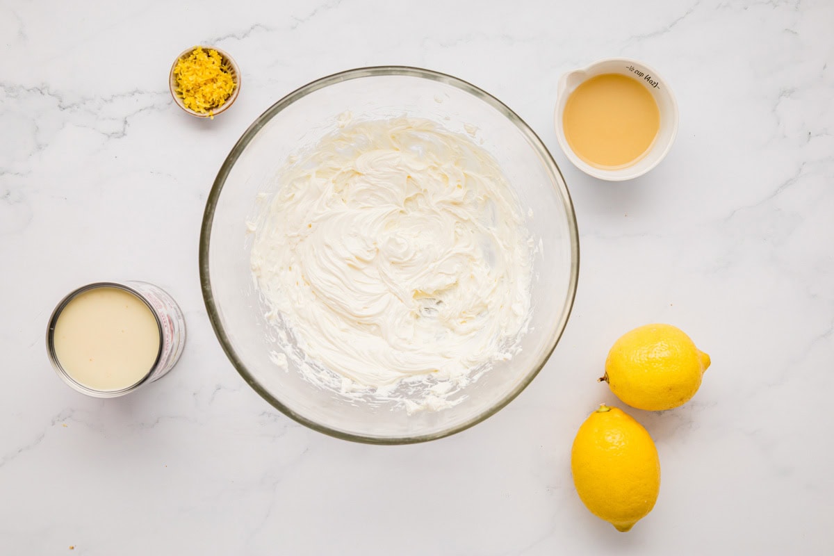 Cream cheese beaten until smooth in a glass bowl.