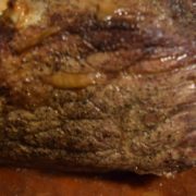 a closeup of this oven baked garlic roast beef