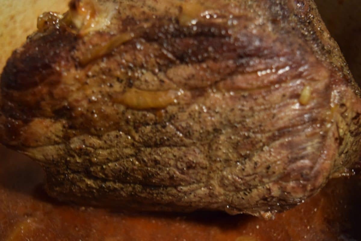 a closeup of this oven baked garlic roast beef