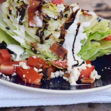 a closeup of this blue cheese ranch wedge salad with balsamic glaze