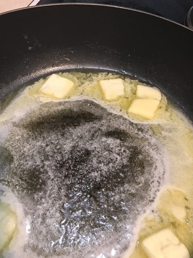 Butter melting in a pan on the stovetop