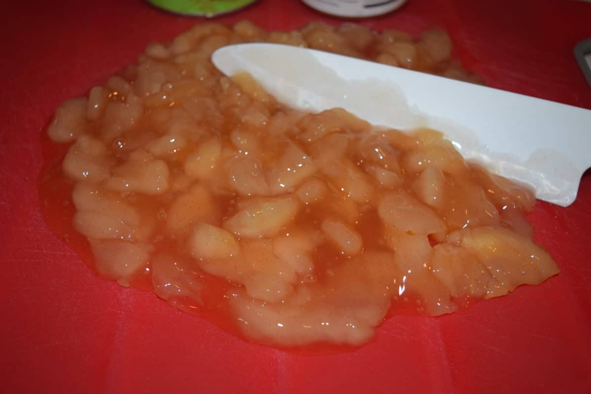 a closeup of the chopped apple fillings for these skillet apple pie biscuit bites