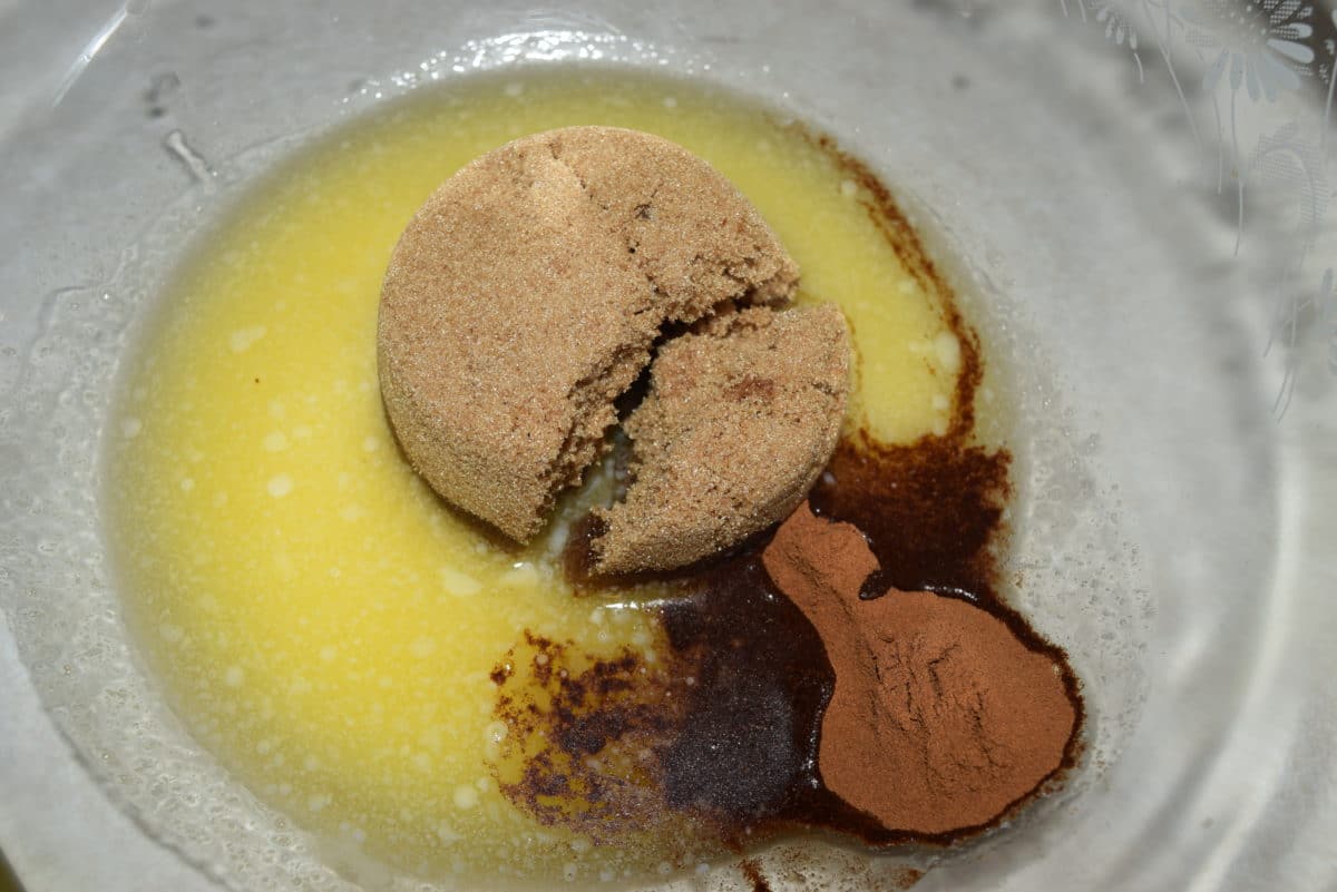 an overhead view of melted butter, brown sugar, and cinnamon to be used in this skillet apple pie biscuit bites recipe