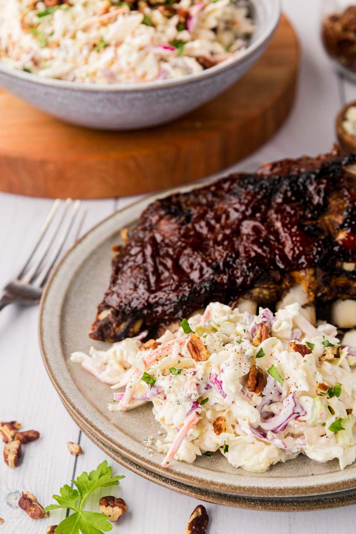 A plate of bbq ribs and slaw.