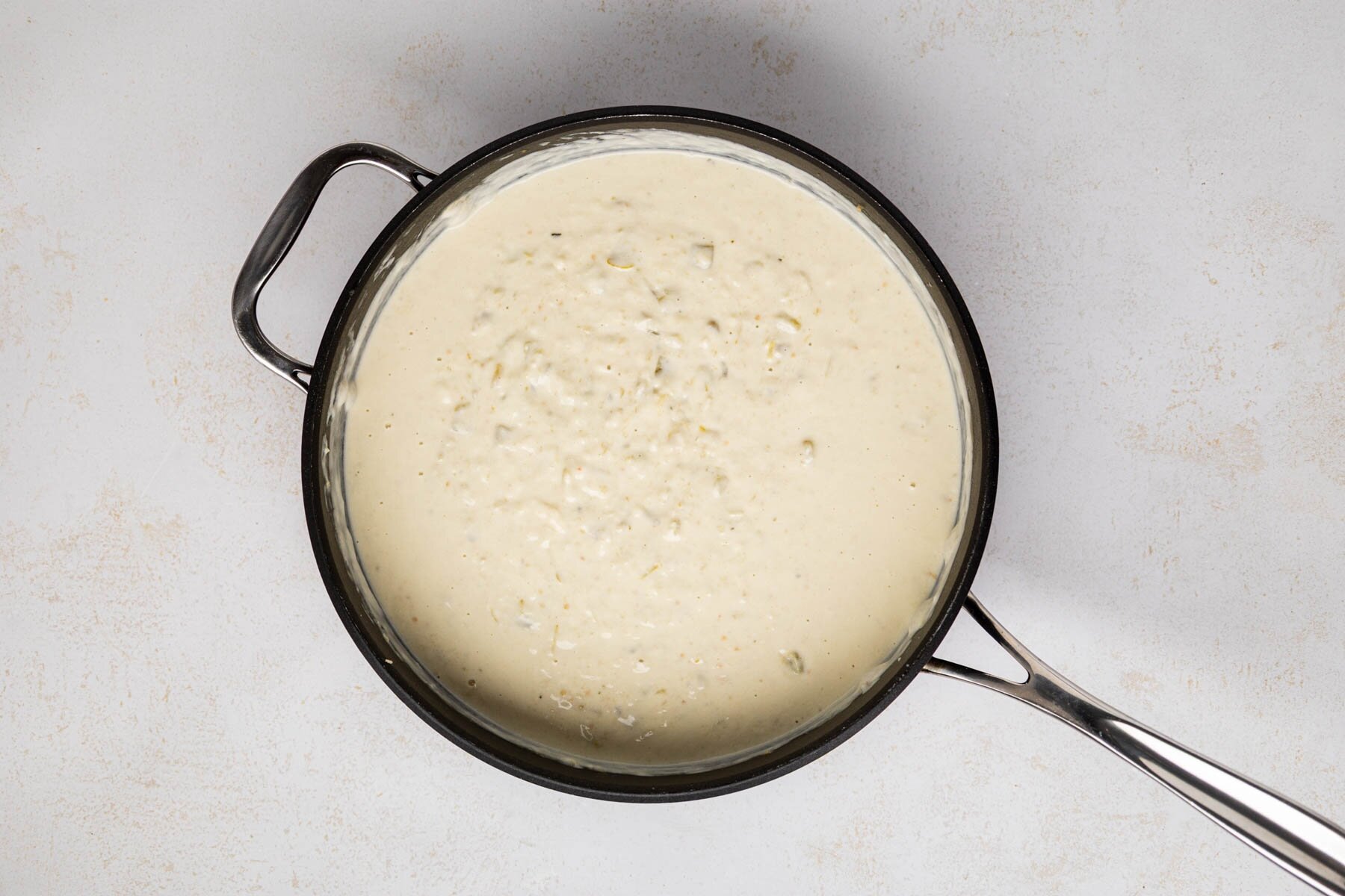 Green chile mixture after cheese and sour cream is mixed in.