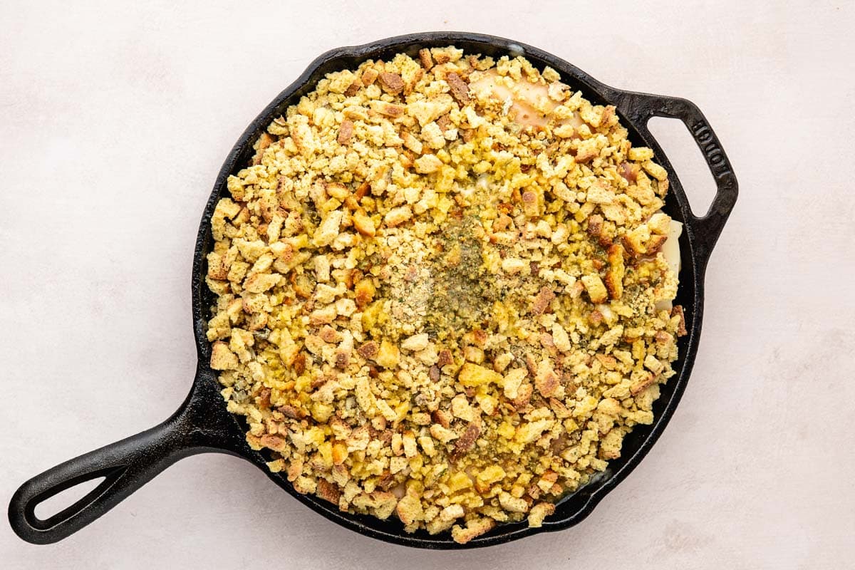 Stuffing mix with butter topping on the casserole before baking.