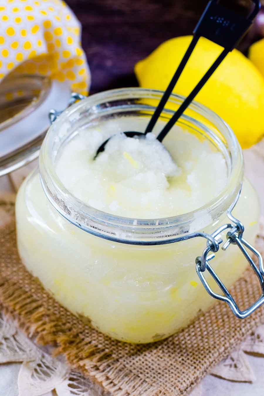 a glass jar of this homemade lemon sugar scrub