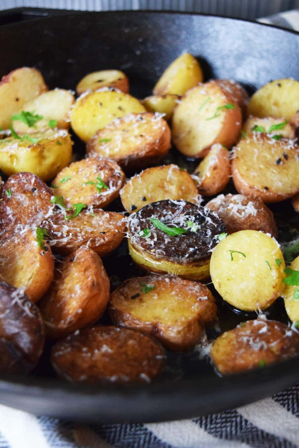 Cast Iron Skillet Garlic & Parmesan Potatoes | Soulfully Made