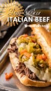 Slow Cooker Italian Beef loaded with peppers and cheese and ready to enjoy.