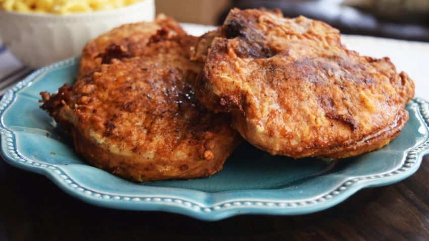 Southern Fried Pork Chops on a turquoise plate