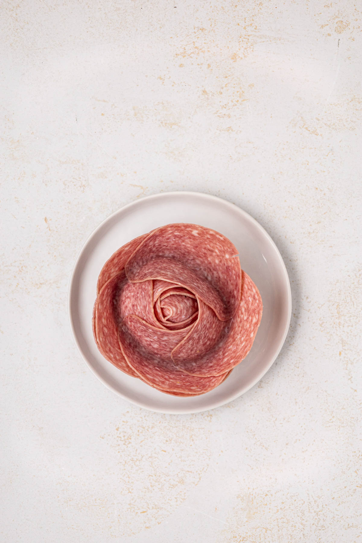Salami shaped like a rose.