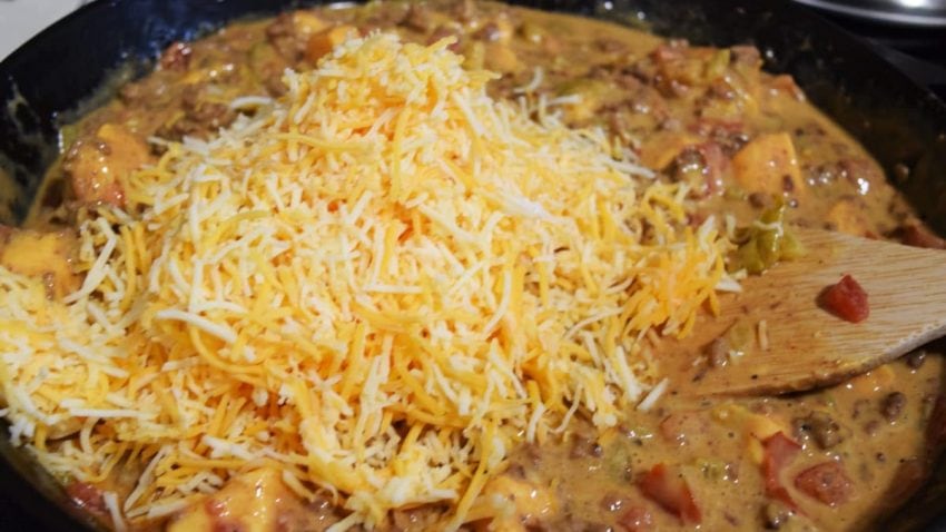 a closeup of all of the ingredients for this skillet beef queso dip recipe