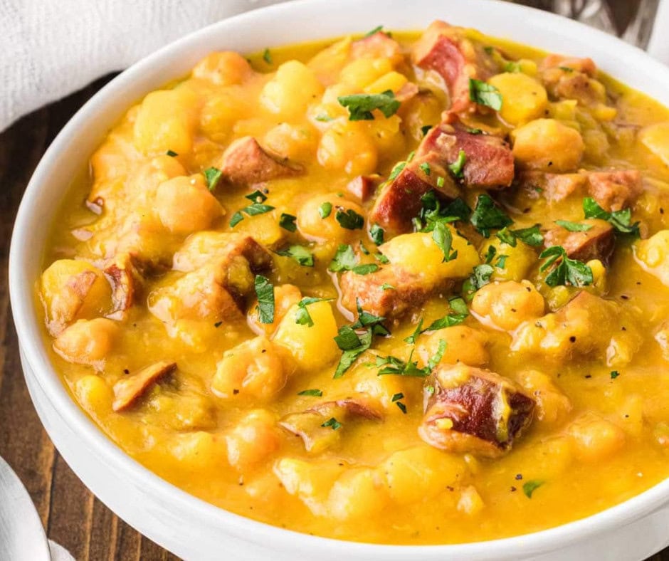 Closeup shot of spanish bean soup in a white bowl