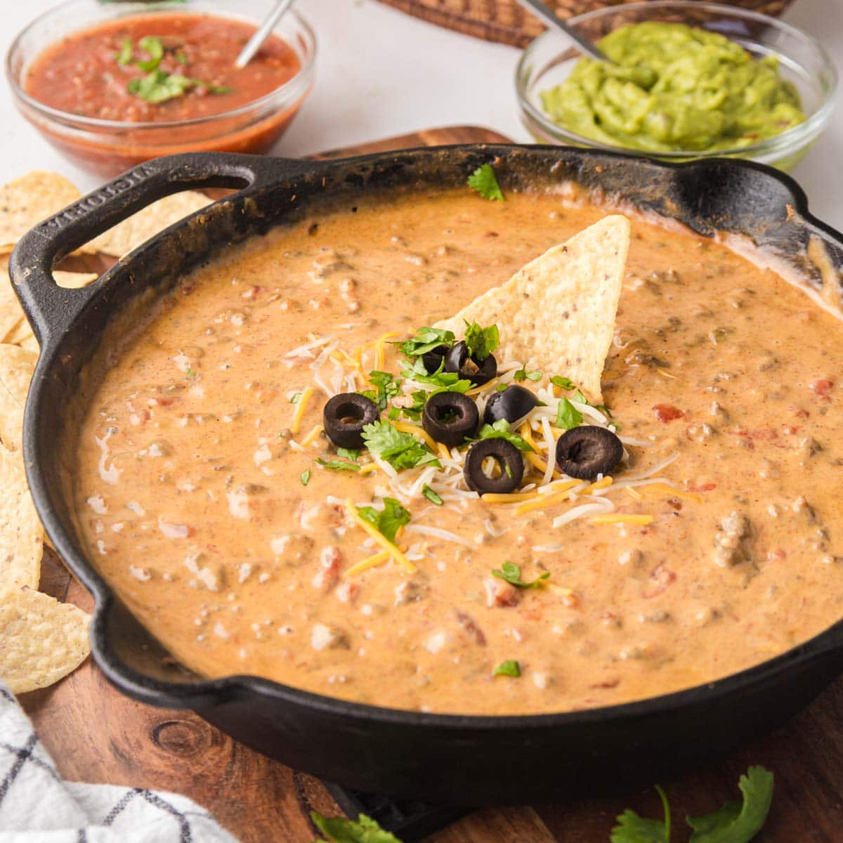 Beef Queso Dip in a cast iron skillet.