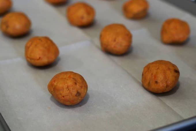 ball of uncooked cookie dough for this butterfinger cake mix cookies recipe