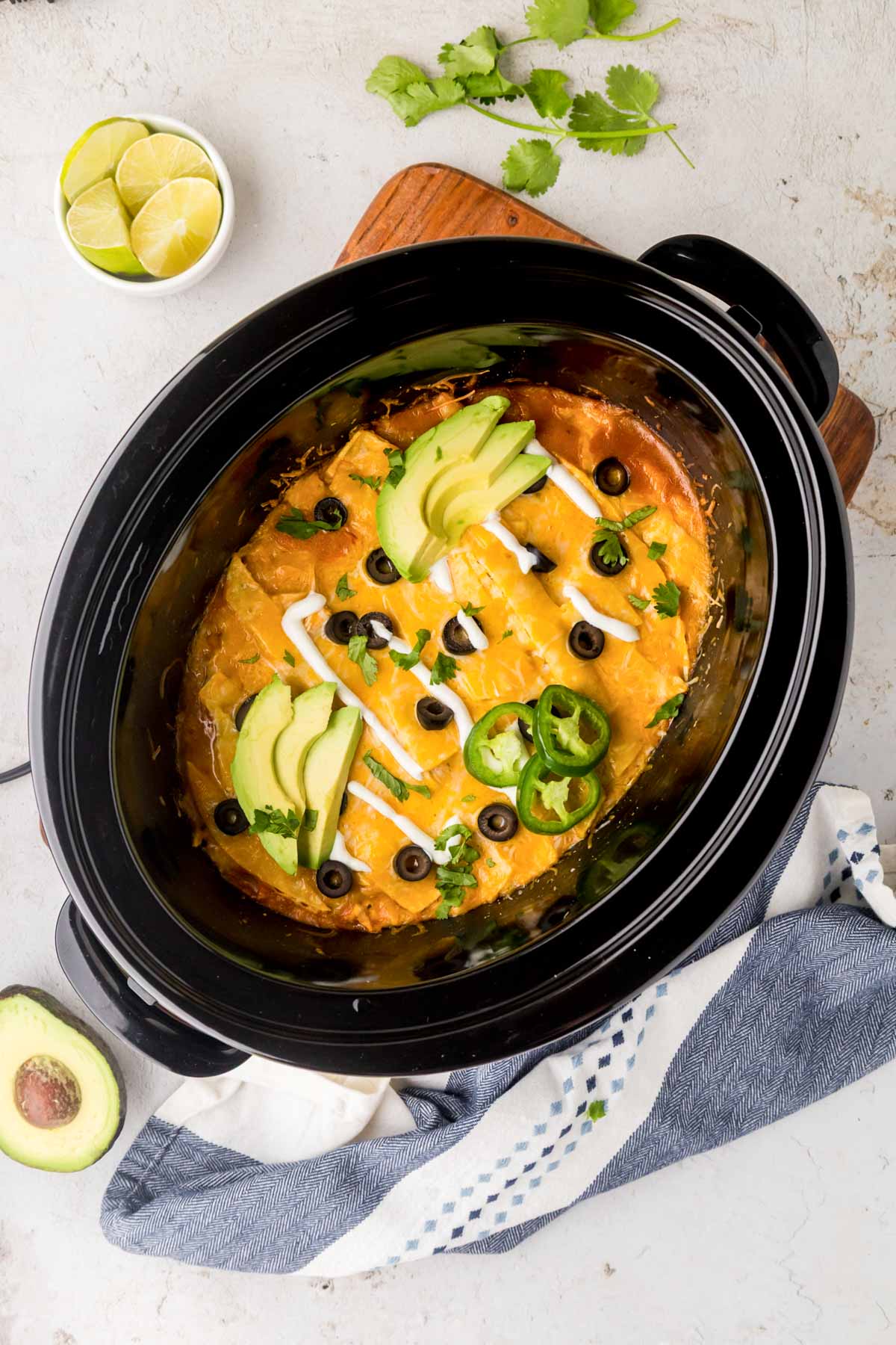 Enchilada casserole cooked in a crockpot.