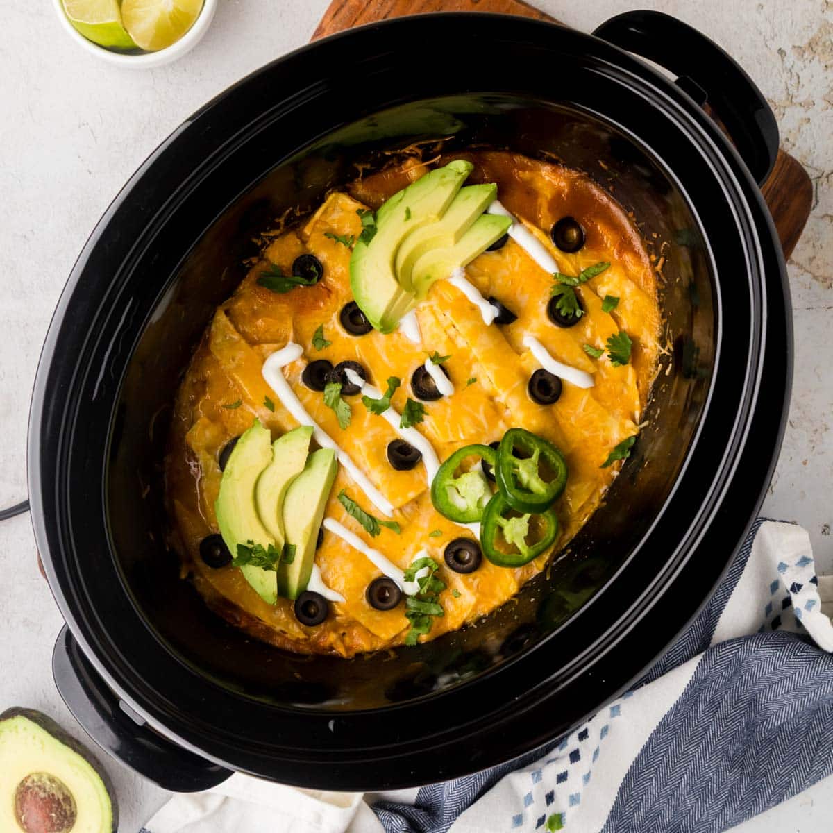 Enchilada casserole cooked in a crockpot.