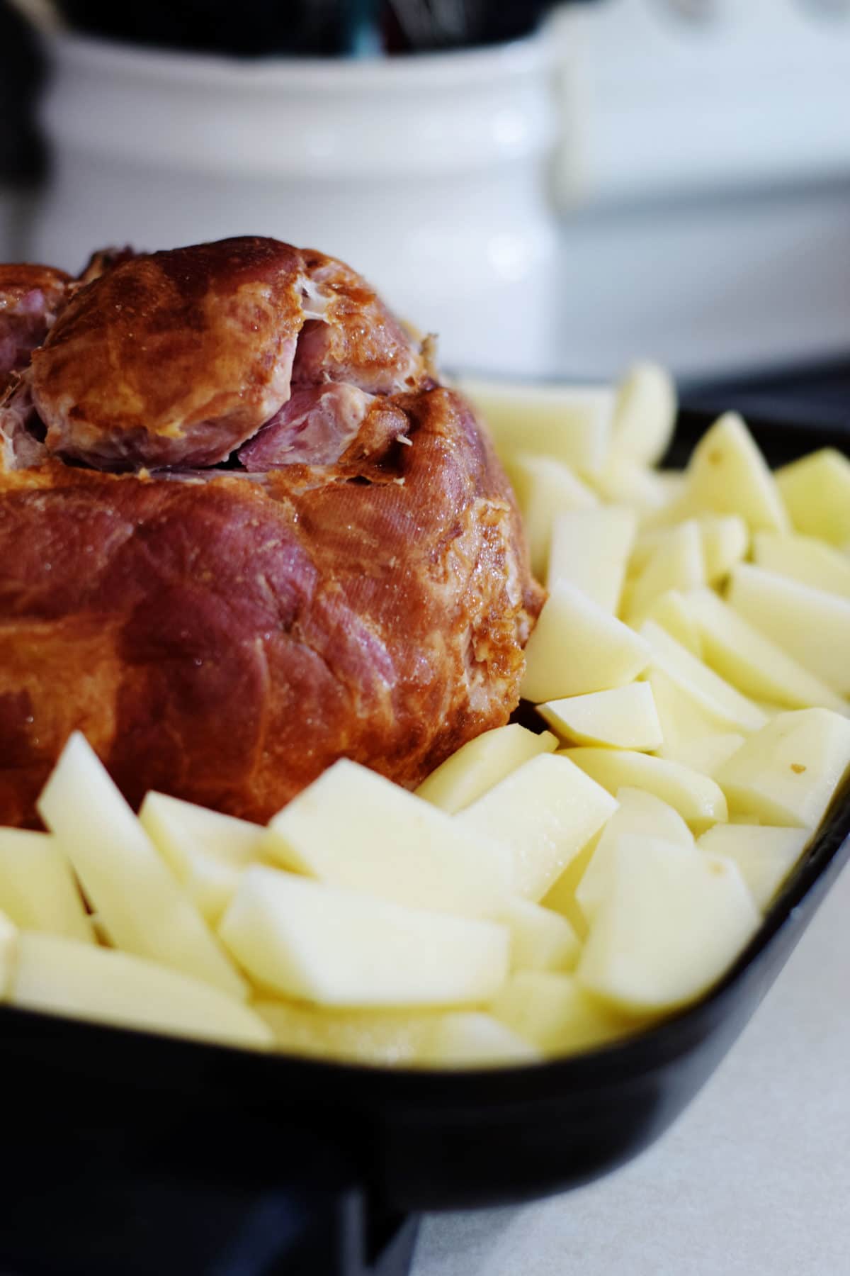 Ham and Quartered Potatoes in a skillet 