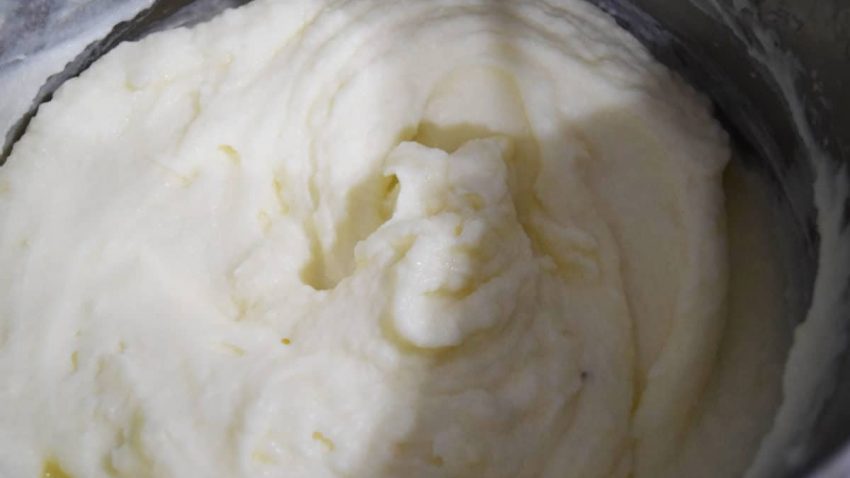 a closeup of creamy smooth mashed potatoes for this instant pot mashed potatoes recipe