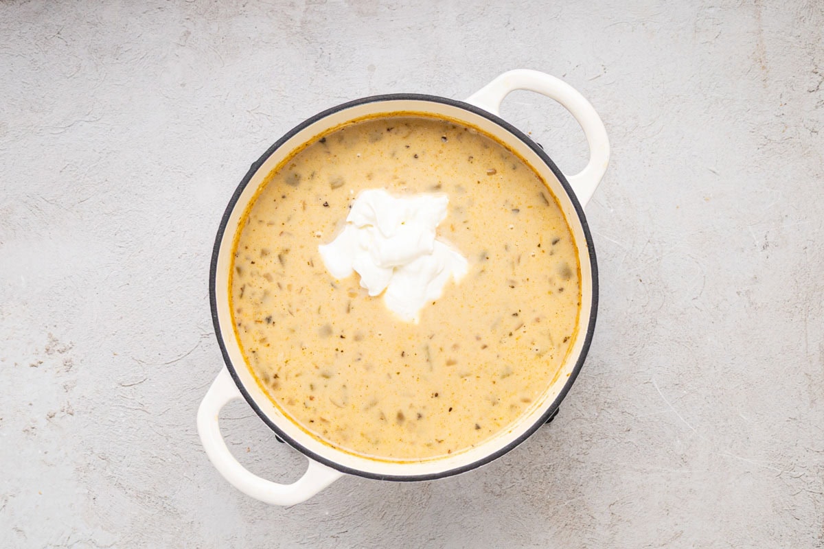 Sour cream and whipping cream added to white chicken chili.