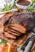 Slow Cooker Beef Brisket overhead image of the brisket on a cutting board with part of it sliced.