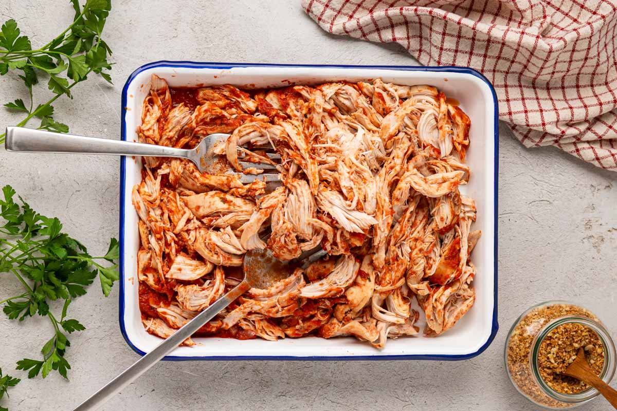 Chicken shredded on a platter.
