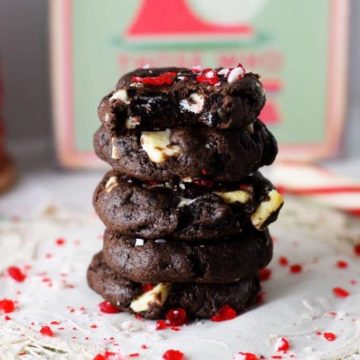A stack of chocolate peppermint Oreo cookies with crushed peppermint