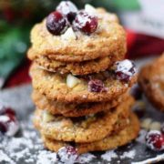 A stack of candied cranberry walnut oatmeal cookies for Christmas
