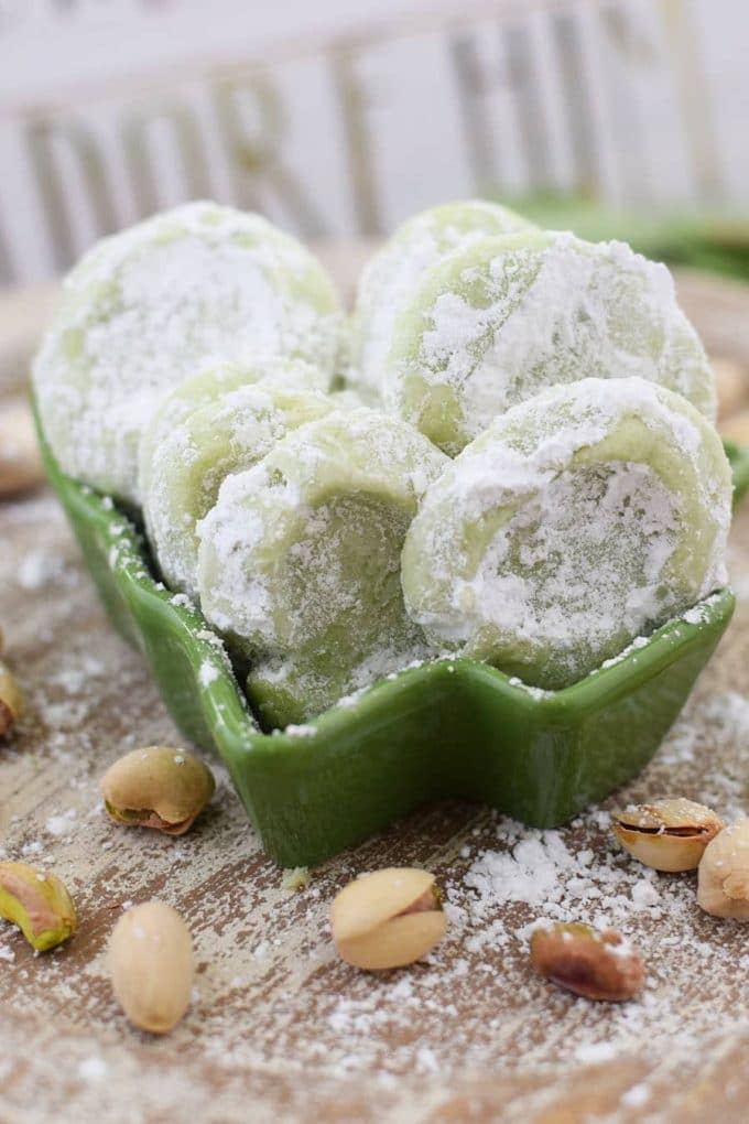 Pistachio Wedding Cookies in green Christmas tree bowl