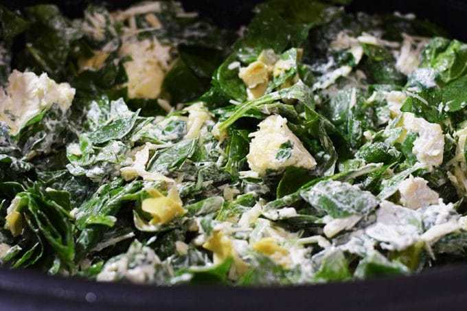 a closeup of this slow cooker spinach artichoke dip