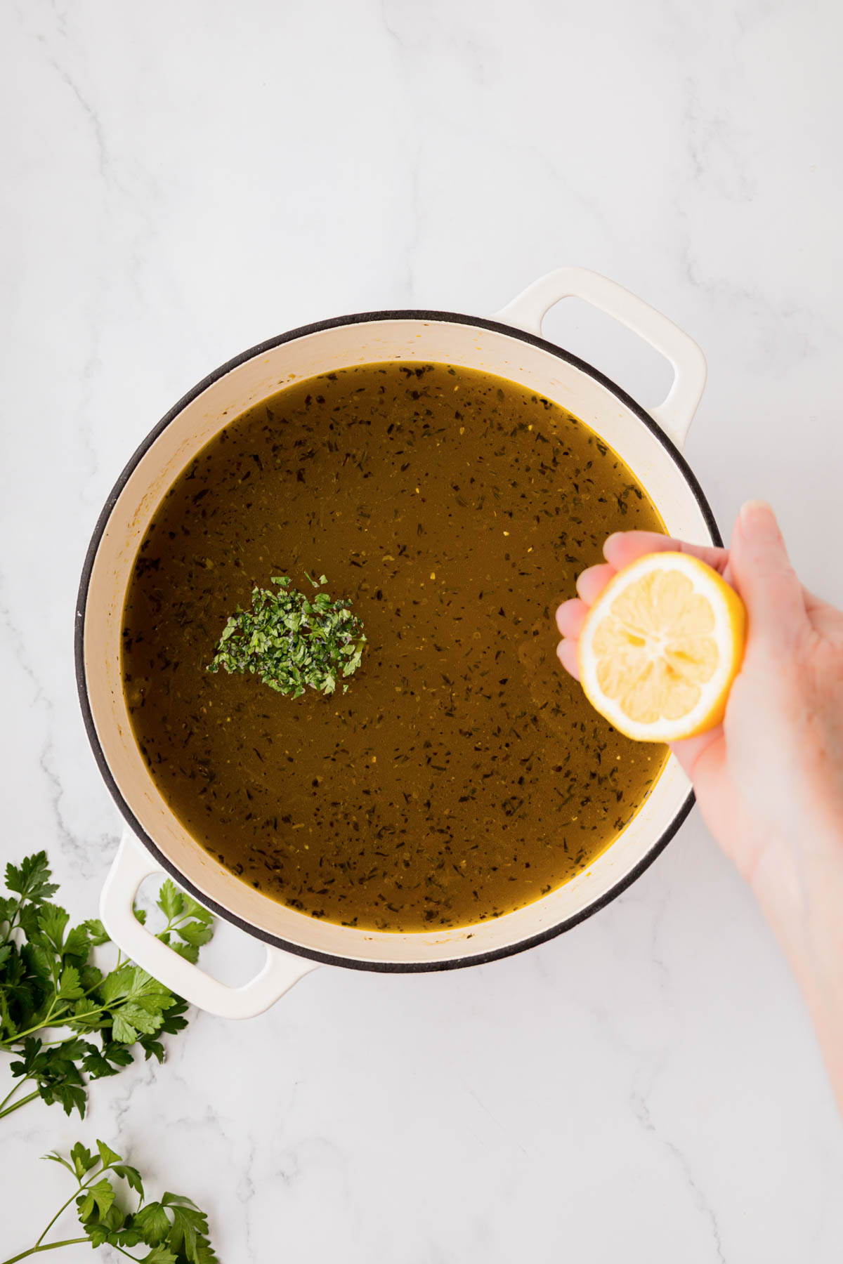 Fresh chopped parsley andl emon juice added to broth.