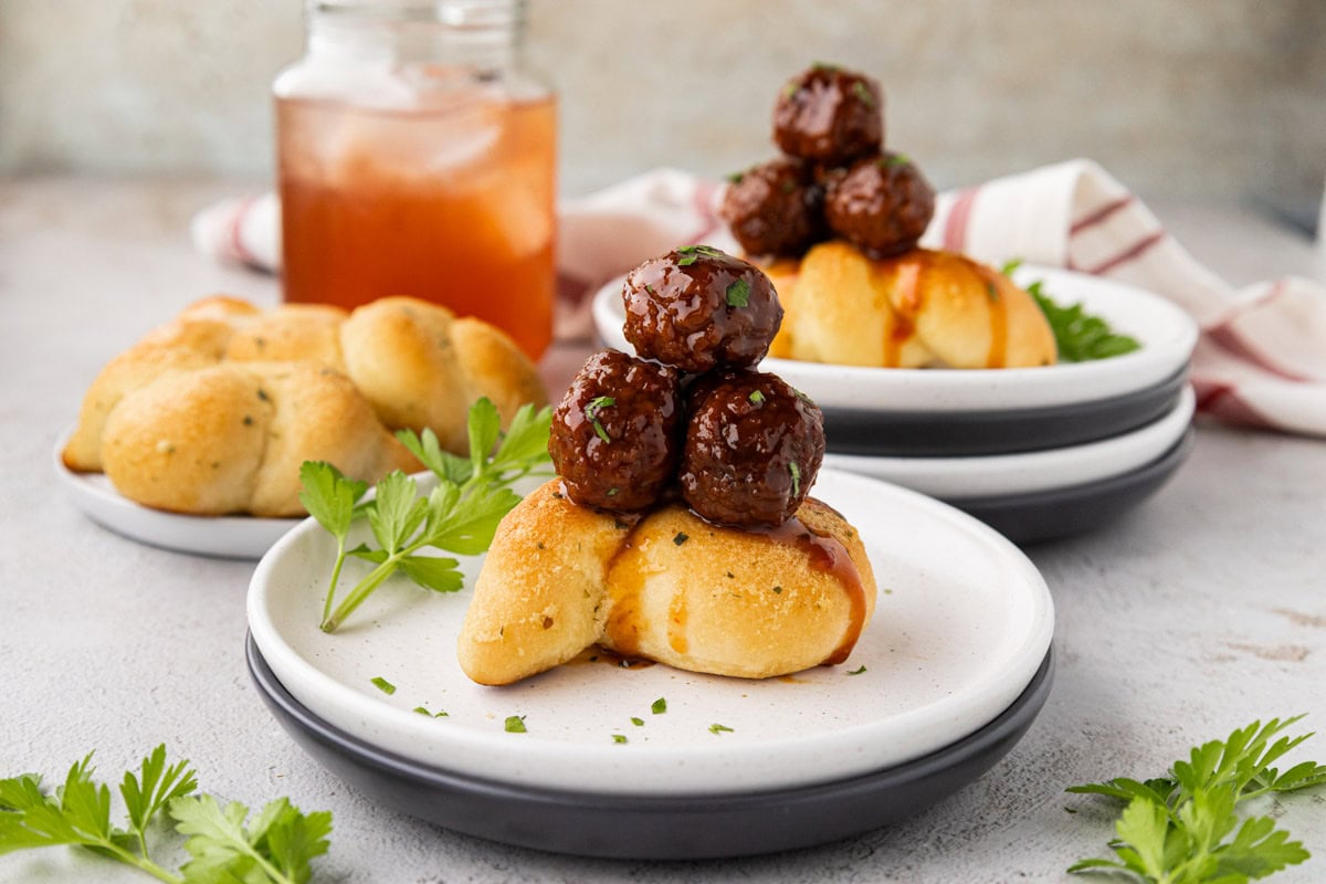 Pepper Jelly meatballs served on garlic knots.