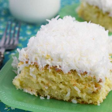 Coconut Cream Poke Cake on a green plate