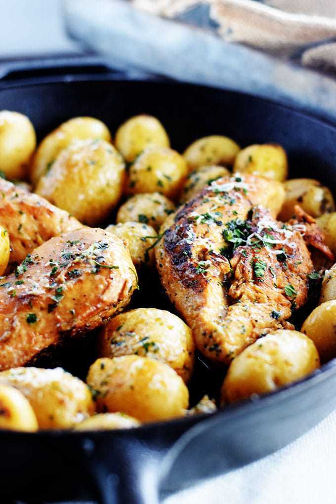 chicken breast cooked in a cast iron skillet with potatoes. Marinated in a lemon and herb dressing.