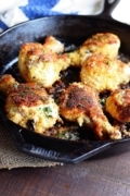 Oven Fried Panko Crusted Chicken Drumsticks in a Cast Iron Skillet