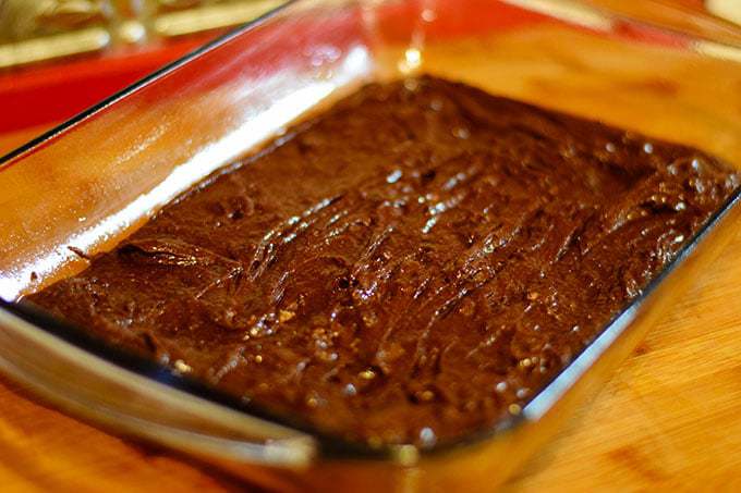 Brownie Mix poured into a glass baking dish