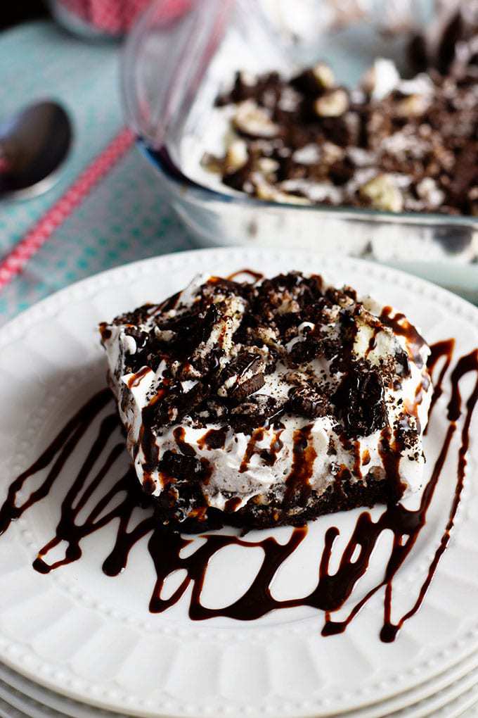 Oreo Brownie Poke Cake Drizzled with Chocolate