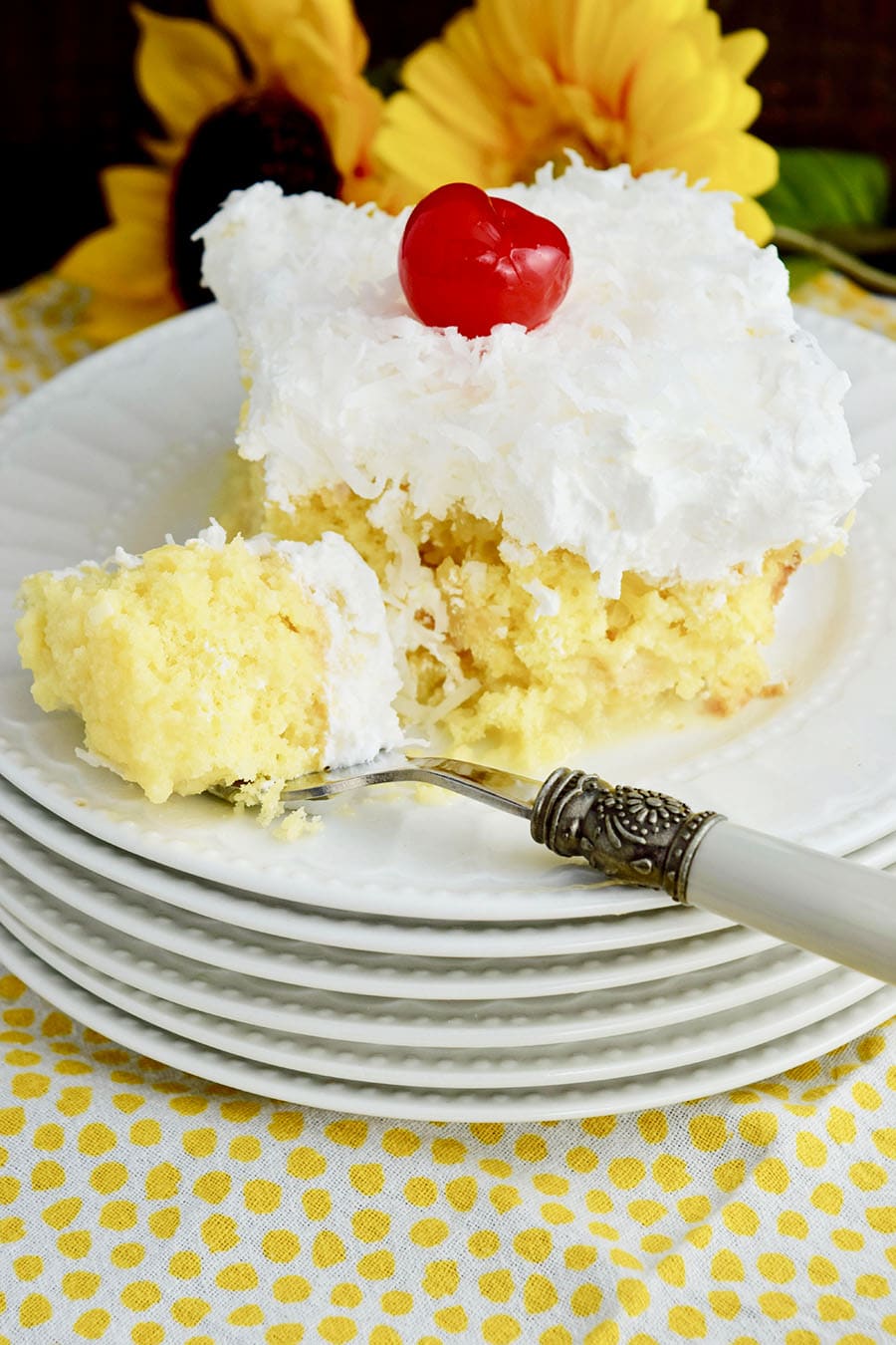 Pina Colada Poke Cake with Fork