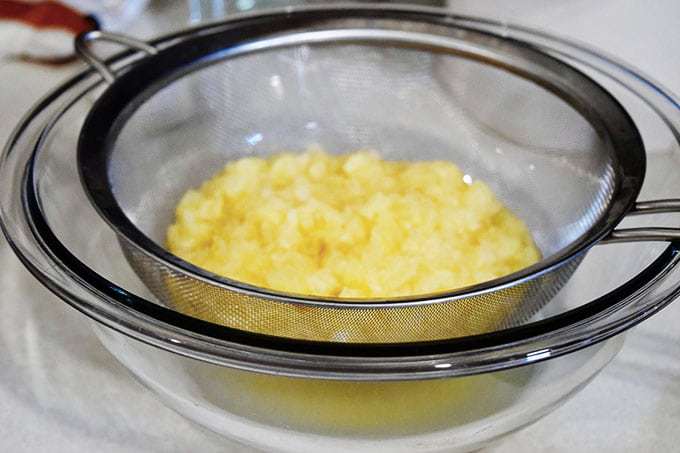 Draining Pineapple in strainer