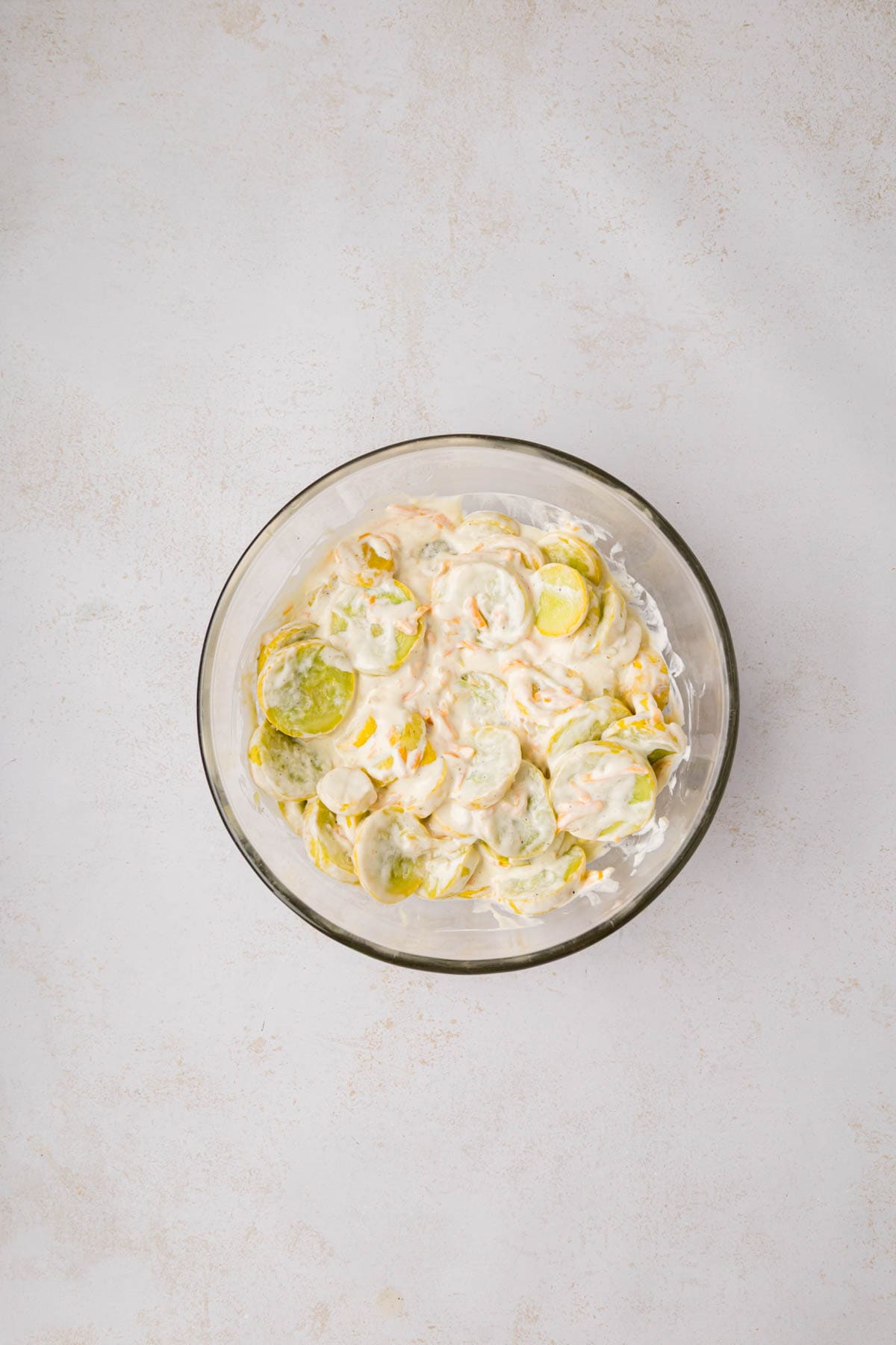 Cooked squash mixed with sour cream mixture.