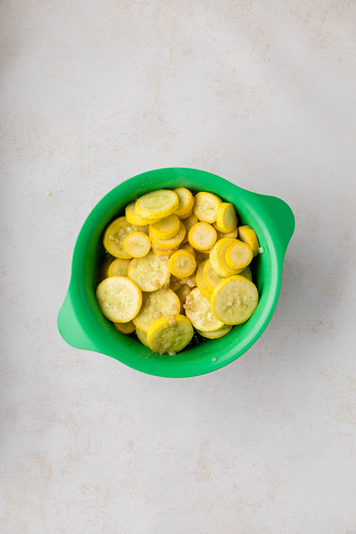 Draining squash in a collander.