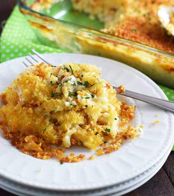 Easy Chicken and Rice Casserole on a white plate with fork