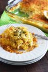 Easy Chicken and Rice Casserole on a white plate with fork