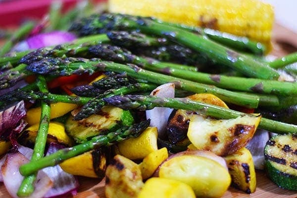 an closeup of the grilled veggies used in this colorful grilled summer vegetable pasta salad recipe