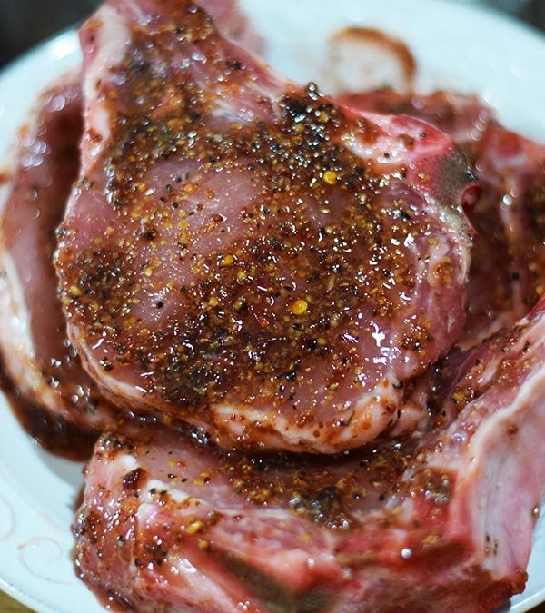 Marinated Sweet and Spicy Mustard Pork Chops on white plate