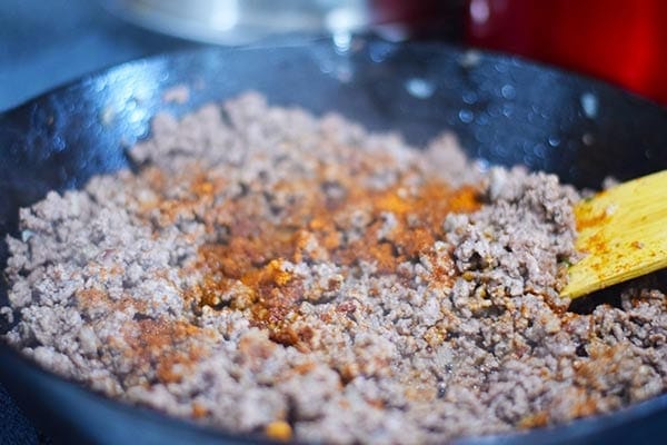 a closeup of this browned ground beef with taco seasoning for the taco spaghetti bake recipe