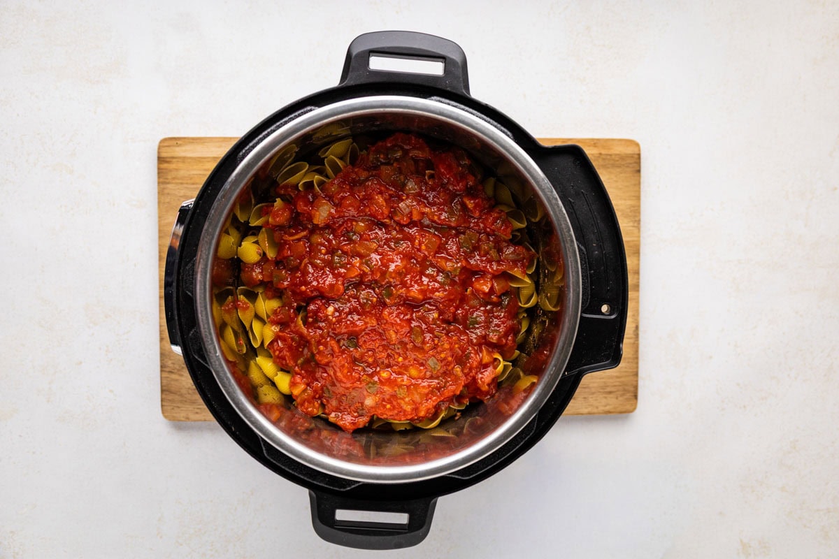 Salsa on top of the pasta in the instant pot.