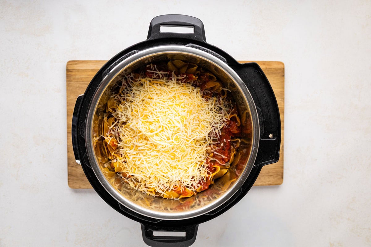 Shredded cheese added to the taco pasta.