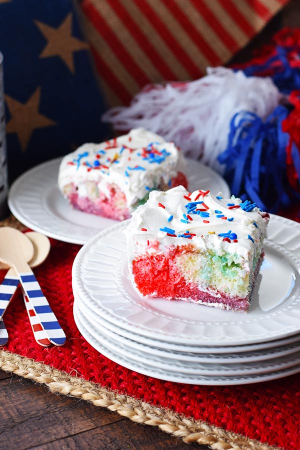 Slice of Red White and Blue Poke Cake